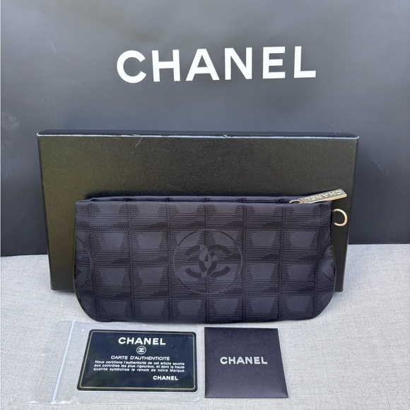 CHANEL Handbags - Authentic CHANEL BLACK nylon sport line clutch pouch NEW